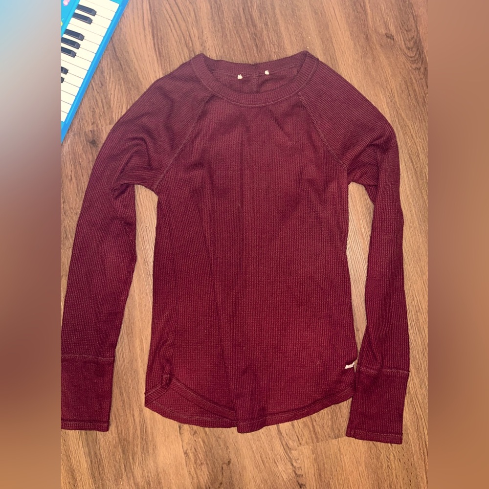 Maroon long sleeve knitted top. Good condition